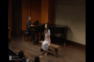 Student learning piano at Lily Chien Music Studio